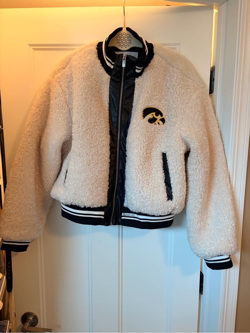 Women’s Iowa Hawkeye Cream Sherpa Bomber Jacket with Black Trim